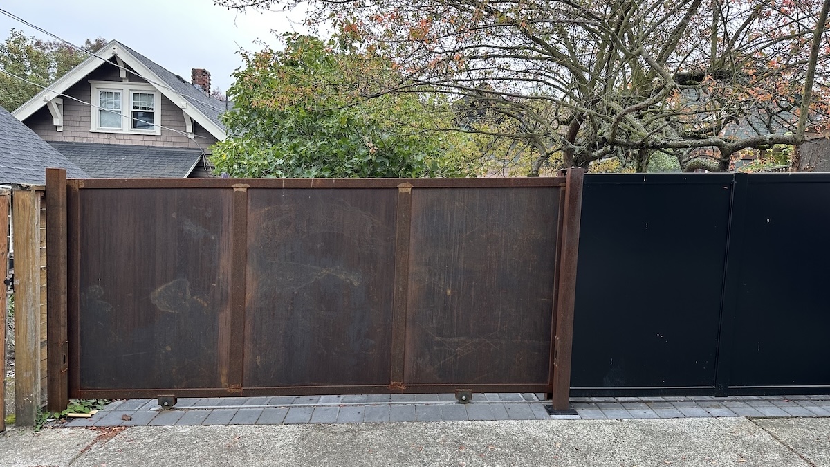 Queen Anne Corten Steel Alley Gate Provides Convenience, Safety, And Privacy